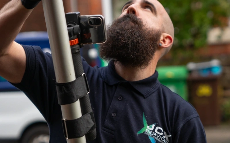 Gutter vacuum clearing and downpipe checks